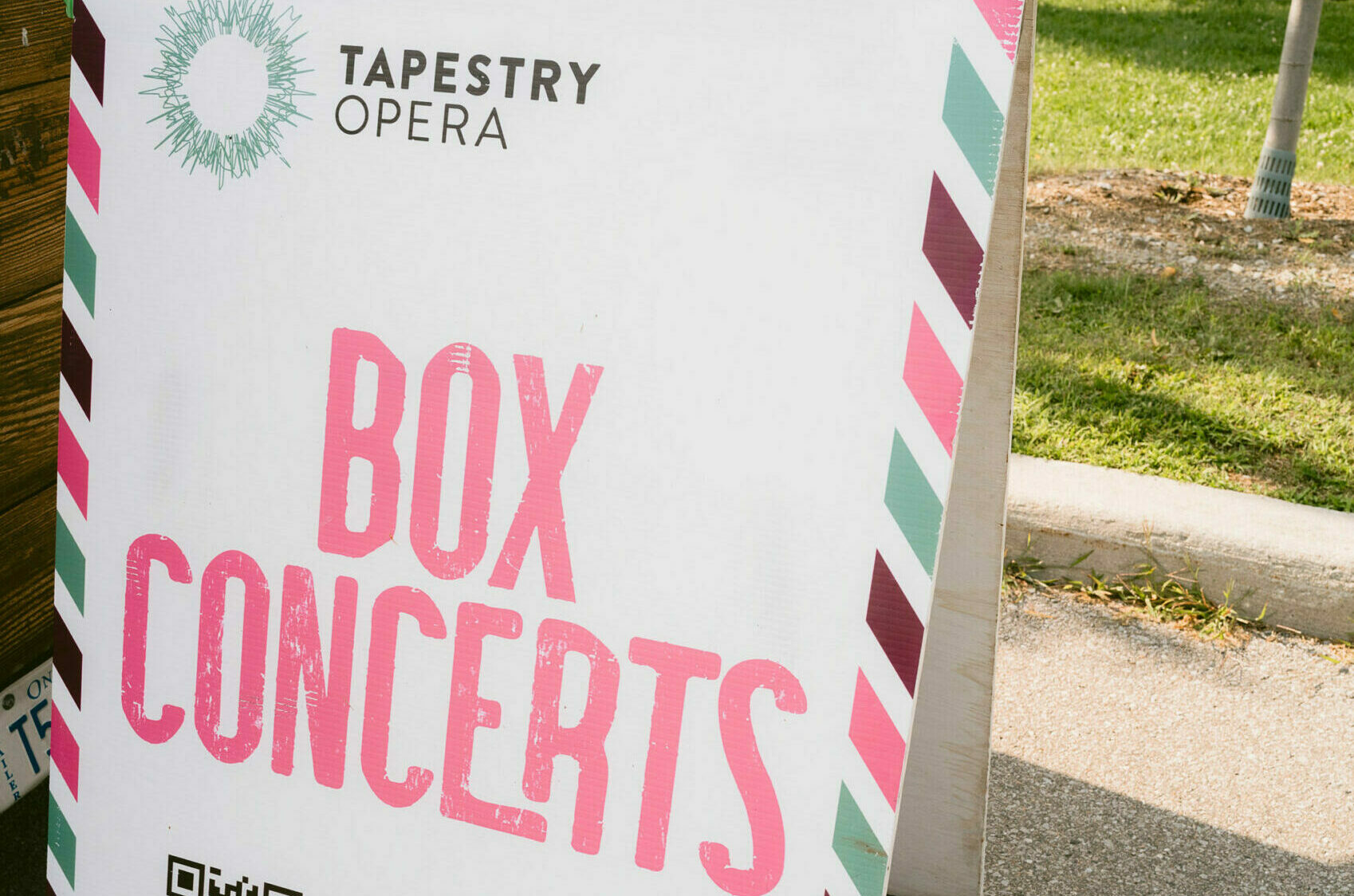 A sign that says, “Tapestry Opera Box Concerts.”